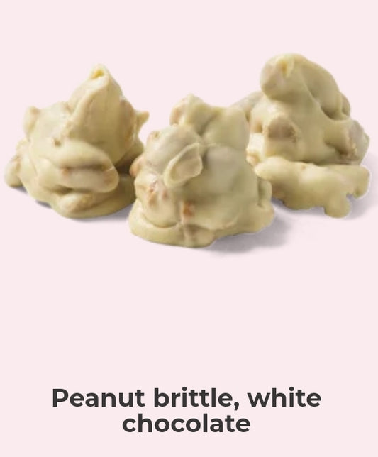 Peanut brittle, white chocolate  - per. 100 grams